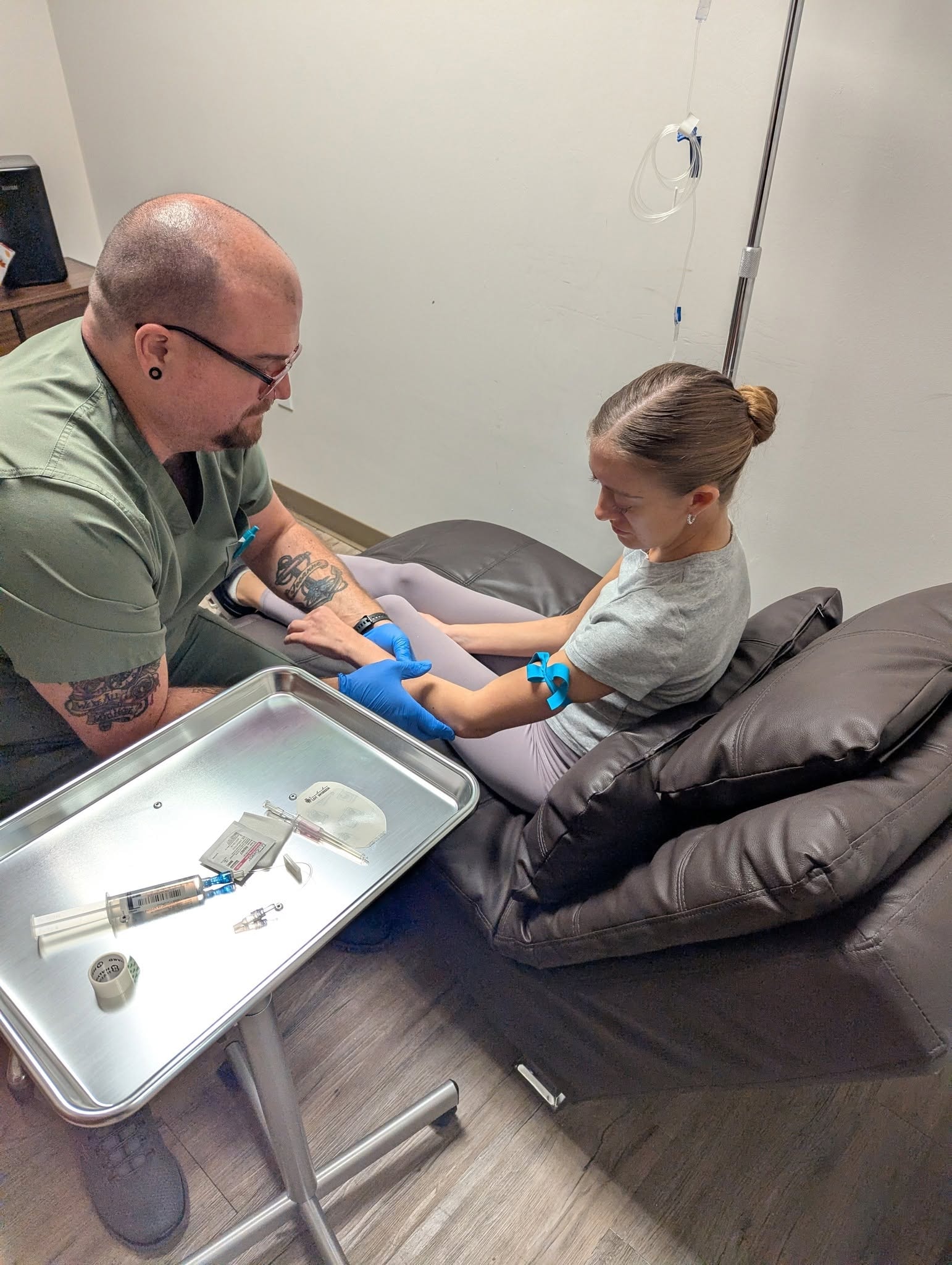 Synergy MediSpa provider administering IV treatment to a patient